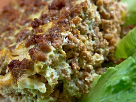 At the table: <em>Bobotie</em>