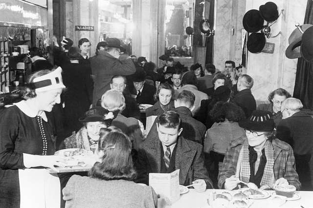 customers enjoying afternoon tea at lyons corner house on coventry street london